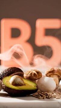 Steaming Avocado and Mushrooms on Table with B5 Sign Vitamin B5
