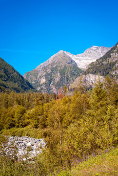 Summer panorama of the mountains surrounding the village of Antronapiana, in the Antrona Valley, near the Italy-Swiss borders (Piedmont, Northern Italy).