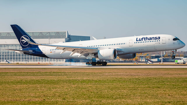 D-AIXO Lufthansa Airbus A350 passenger jet airplane touchdown with smoking tires on a sunny spring day at Munich airport, MUC, Freising, Bavaria, Germany