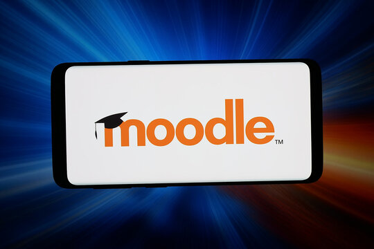 Stuttgart, Germany - 06-11-2026: In this photo illustration, the logo of open-source learning management system Moodle is displayed on a smartphone in front of abstract background on computer screen.
