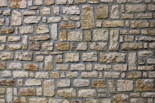 Texture de mur en pierre et joint b&eacute;ton gris