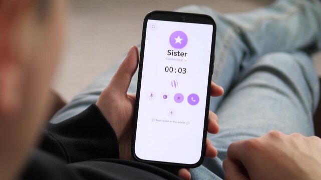an ongoing call with a sister displayed on a mobile screen. The interface shows a timer, purple audio wave, and a Best sister in the world message. Ideal for illustrating warmth, family ties, and