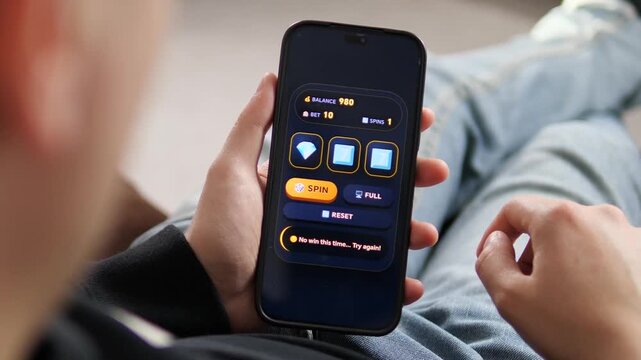 High-quality mobile casino app interaction. Close-up of user spinning reels and tracking balance on a smartphone. Ideal for UI, UX showcases, gambling marketing, and fintech promos. Realistic