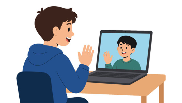 Boy waving during video call on laptop at desk