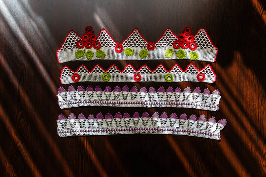 Hand-crocheted lace on the background. Handmade lace used in dowries and decorative embellishments.