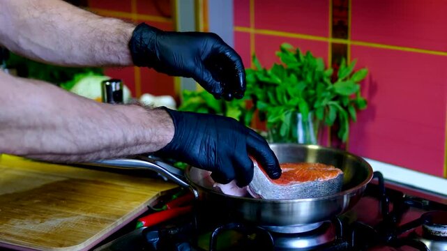 Step by step salmon recipe asparagus garlic butter cooked on stainless steel skillet in modern kitchen healthy gourmet meal preparation salmon recipe, healthy, cooking process, restaurant style meal