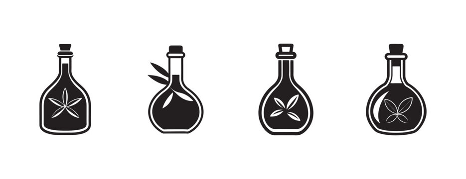 bottles with marijuana leaves on them standing upright on white background for medical or recreational cannabis concept