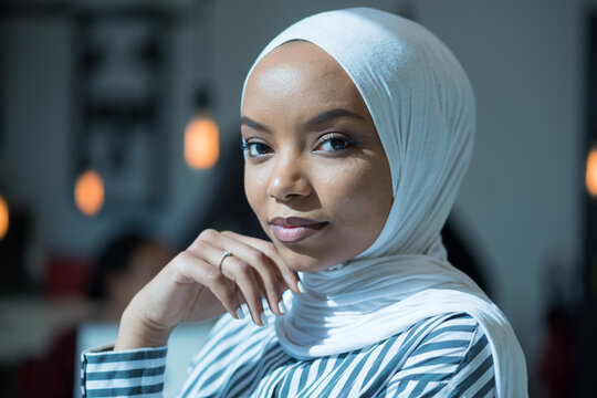Close Up Portrait of Elegant Muslim Female Entrepreneur looking at Camera