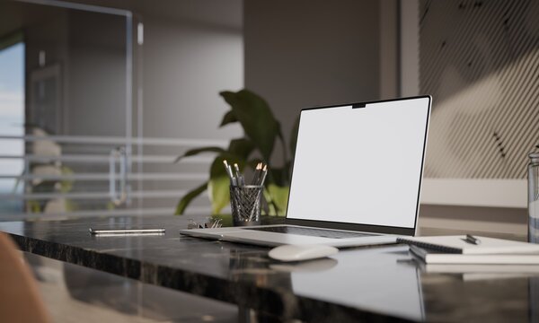 Modern office workspace with laptop mockup and black marble desk