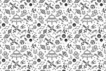 Space themed pattern background. Seamless pattern of space themed doodle pattern background. Hand drawn spaces doodle pattern background. Seamless space planet kid doodle universe design. © Predi