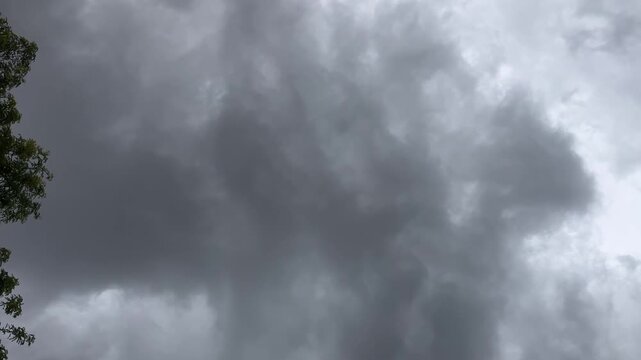 Fast moving dark storm clouds with lightning flashes during prior to a tornado outbreak in the American midwest