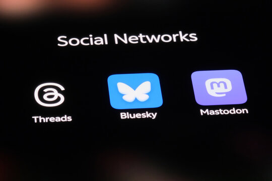Shanghai,China-June 16th 2026: Bluesky, Mastodon and Threads app icon. Social networks apps.