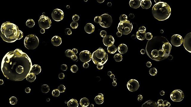 Yellow bubbles of omega 3 oil are flying forward in the air on black background. Health, medical and science concept. It can be used as water, juice, wine drops. Also suitable for cosmetics products.