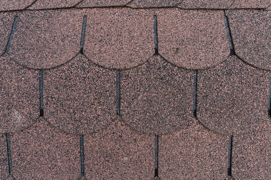 Mottled Reddish-Brown Dark Grey Asphalt Shingles Texture Repeating Granular Rough Surface Background for Design with Copy Space