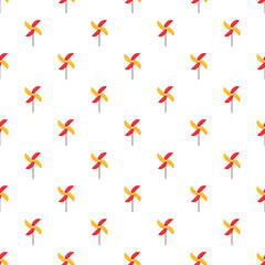Fototapeta premium Seamless pattern featuring red and yellow pinwheels on a white background