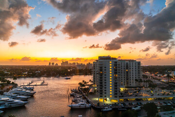 Aerial view of Fort Lauderdale waterway canals, residential homes and skyline at sunset © Maria