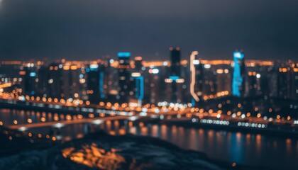Fototapeta premium Blurred City Skyline at Night with Illuminated Buildings, Concept of Urban Modernity