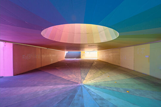 The rainbow colored pedestrian underpass to the metro station Ecublens VD, EPFL, Lausanne, Switzerland. 