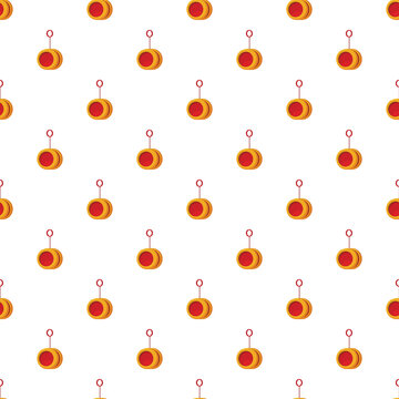 Yo yo toys forming a playful red and yellow repeating seamless pattern