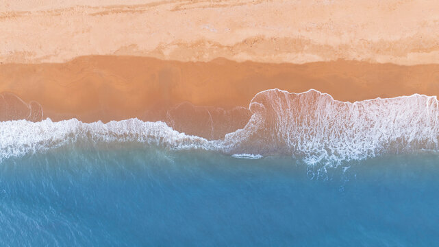 Aerial Tropical Beach Background with Turquoise Ocean Waves and Sandy Coastline