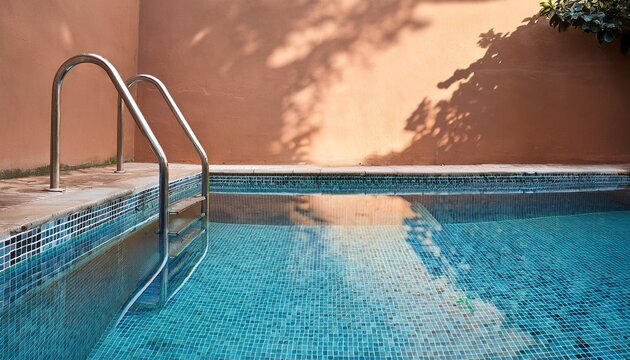 staircase pool or pool ladder outdoor swimming pool in old hotel with brown wall