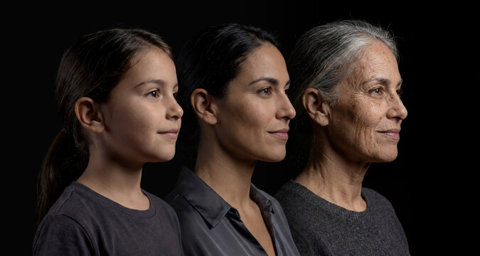 Side view profile of three generations of hispanic women