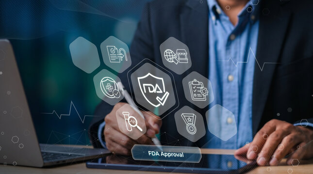Professional working on FDA approval process for medical technology and digital health solutions on laptop