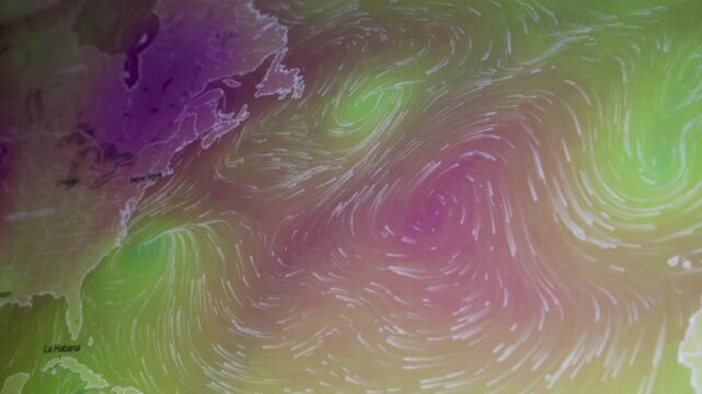 North Atlantic ocean weather cyclone winds pressure storm graphic display overlay changing camera shot of computer screen pixels visible