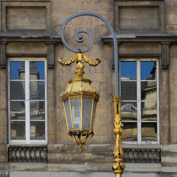 Ornate Paris Street Lamp and Building Windows