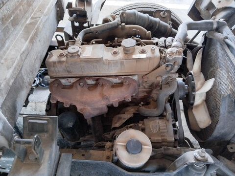 Close-up of dirty car engine