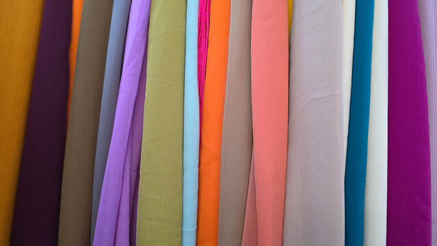 Colorful Textured Fabric Swatches Arranged Vertically