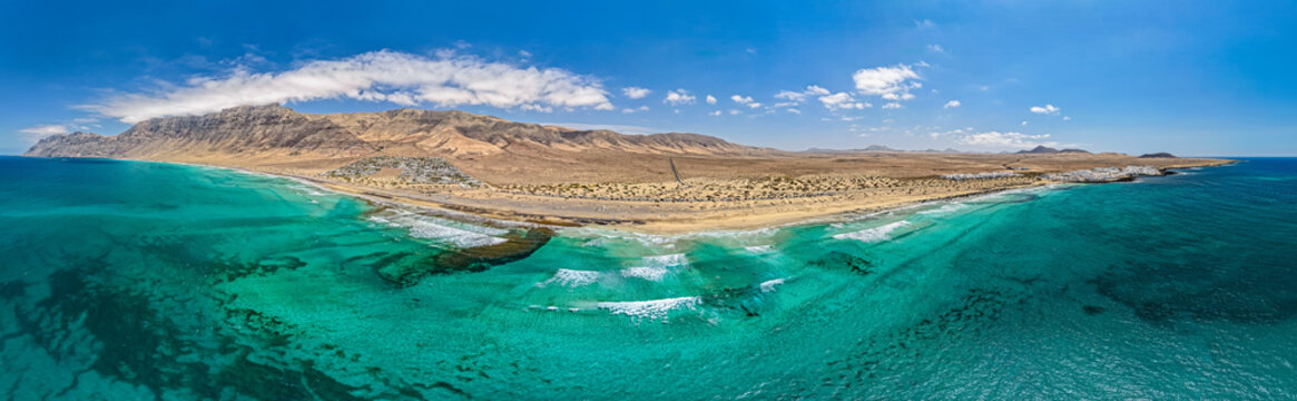 Ultra Wide Aerial Panorama of Famara Beach Cliffs and Coastal Village in Northwest Lanzarote
