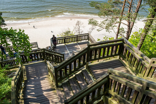 Scenic Wooden Stairs on Kawcza G&oacute;ra Overlooking Baltic Sea Beach in Miedzyzdroje, Poland