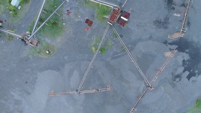 Aerial view of volcanic aggregate processing facility using Mayon Volcano minerals in the Philippines. Ideal for themes of quarrying and economic development.