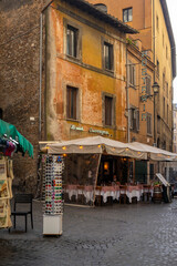 Fototapeta na wymiar Historic street in Rome, Italy with traditional architecture