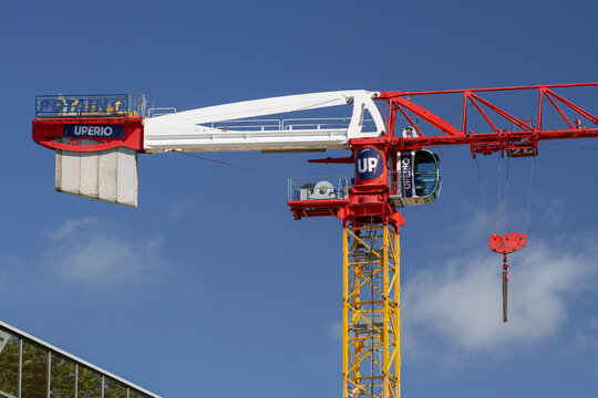 Laxou, France - June 13th 2026 : View on a flat-top tower crane Potain MDT 268 J10 on a construction site for the construction of a building.