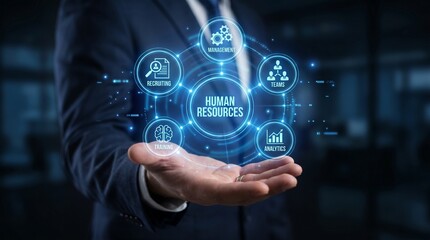 Fototapeta premium Businessman's hand presents glowing human resources digital interface with key