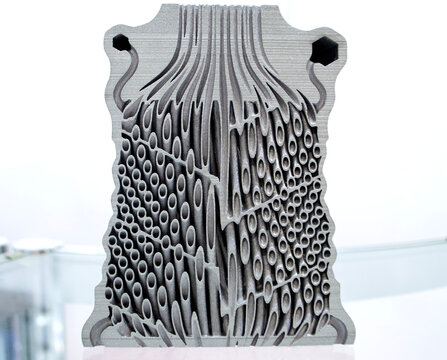 Object printed on 3D printer. Filter or heat exchange element. Model printed on 3D printer from metal powder. Aluminum alloy. Selective Laser Melting technologies SLM. Additive technology. 3D printing