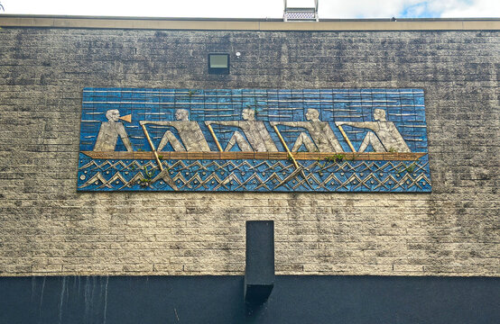 Sydney, NSW  Australia - June 1 2026: Vintage tiled mural depicting rowers on a river. Retro Public Art Mural of Rowing Team on River