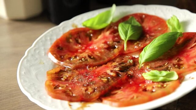 Tomato salad, vegetables tomatoes carpaccio tasty snack fresh delicious gourmet food background on the table, rustic food, top view, copy space keto and paleo diets vegetarian and vegan food