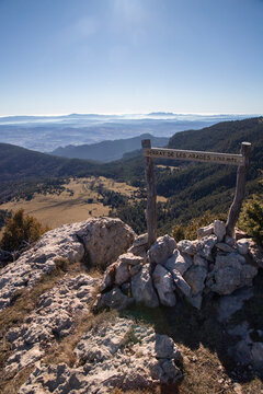 Serrat de les arades sign marking pyrenees mountain summit view