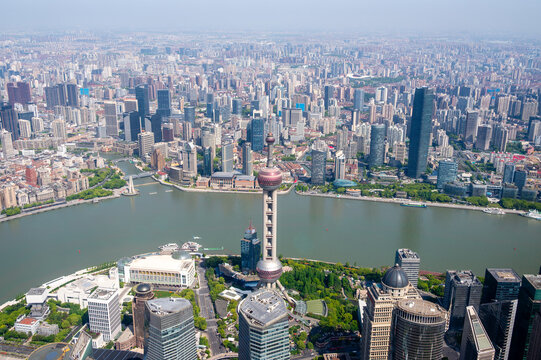 High angle aerial panorama of a modern megacity financial district with an iconic tv tower and river