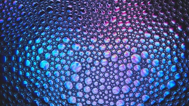 Bubbles forming texture with blue and pink gradient