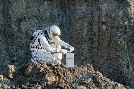 Astronaut conducts research on the lunar surface during a mission in space exploration