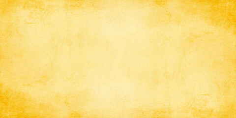 Obraz premium Yellow vintage grunge paper background texture with vignette borders for retro design and backdrop concepts. Vintage, aged paper look with subtle stains, scratches, and darker vignette borders