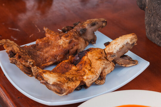 Close-up of traditional fried and roasted guinea pig.