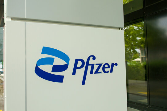 Pfizer pharmaceutical company corporate logo sign close up