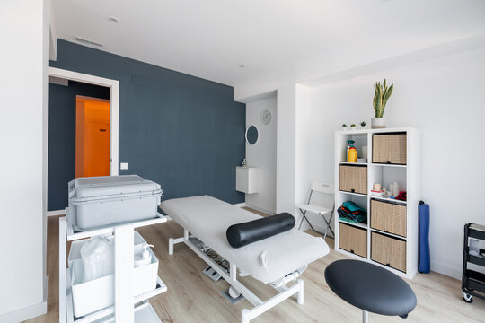 Physiotherapy clinic treatment room empty