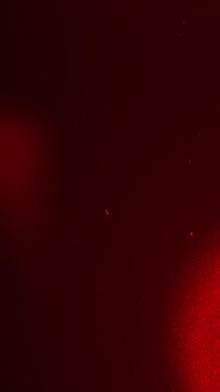 Vertical Cinematic Red Light Leaks Film Burn Overlay for Vintage Transitions and Grunge Texture Stylization 4k video