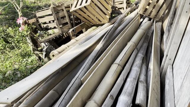 Stacked Dry Bamboo Stems and Wooden Pallets Outdoor